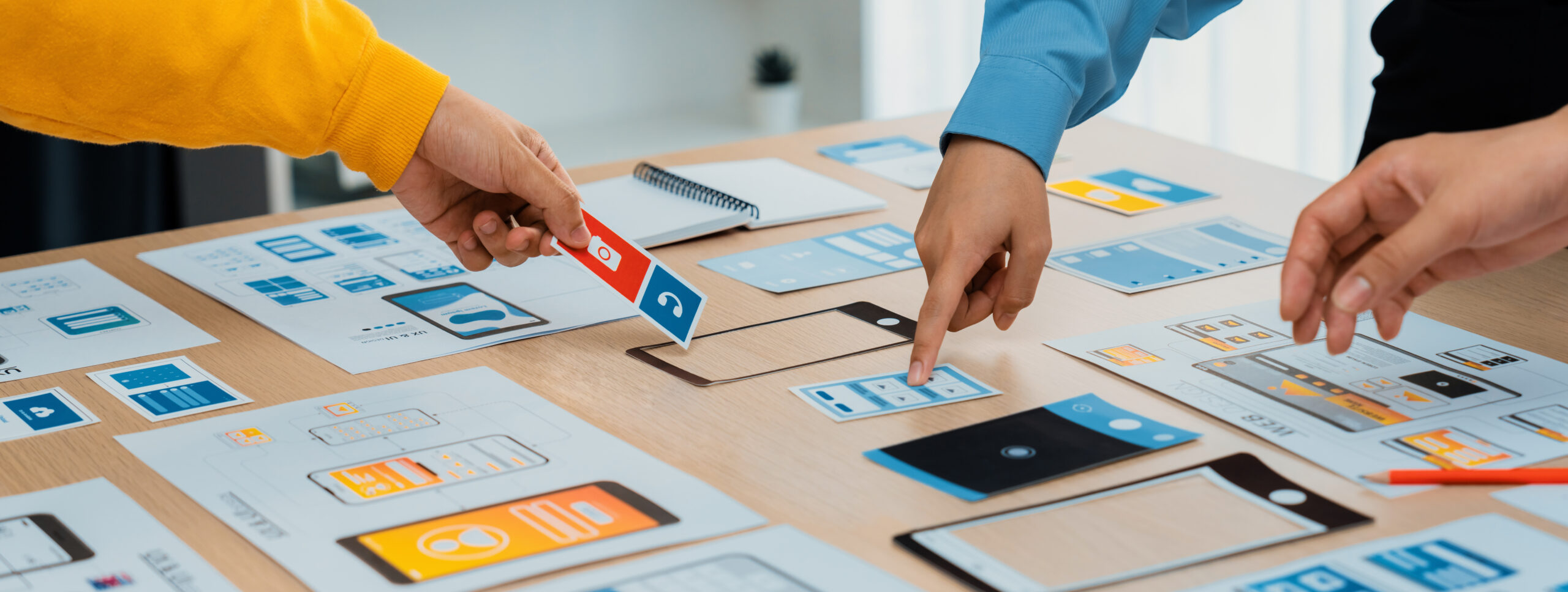 Panorama banner of startup company employee planning on user interface prototype for mobile application or website in office. UX UI designer brainstorm user friendly interface plan. Synergic SSUCv3H4sIAAAAAAAACpySy27kIBBF95HyDy3WQcJQBjO/MppFmUc3Cm1aGGc0ivLvg18tss3Odep165rP15fLhYw4B0N+XT7XqMYhxmUuGUtIU8Xs7eDZTdbllnxkIVkLMLSRs6GkHDC2cMRibhPeXYXTEuOKv7YkmQuWZXbzquVABou71hk7fI7YBf/e48uZ2JK1o6YIeWvYvIwbO9E+/Eed+8ef58FXN5l/m+DmkOyiw/2QQyOx3jGObKTcg6UwMKDaK0ux915JAdx5f24mHWPdyJSp2UFT4F5TPXhJQeneuoEjB/4sVoDe+WGkneqBgkWkOHJBtUGtDHiorZv+XTR5/1tcvrcm42JDavz9SAbjWiCamzA8MOO3vkcOJkzXhqRy217IOcmkZSp59edpK4kpPXCM6//3dY07+Q3nuZbbkze7TX2P6d7smVLZ3D2mElufyRp2ojqpBpDQ80EC6+Ao2J/WLdQ5m5xzUI3Ne7DtVWFVQAS3spedoFKioSCNoIN2gipptXXQg+Wuuvr1HwAA//8DAKuRiVFDAwAA